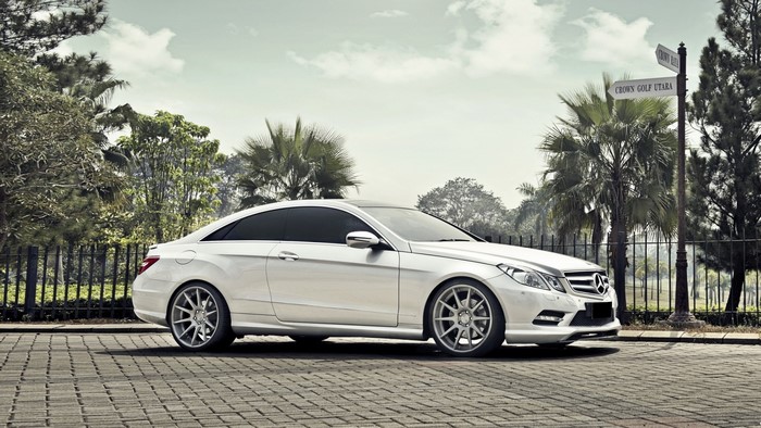 White Mercedes-Benz E-Class Coupe on Paved Road