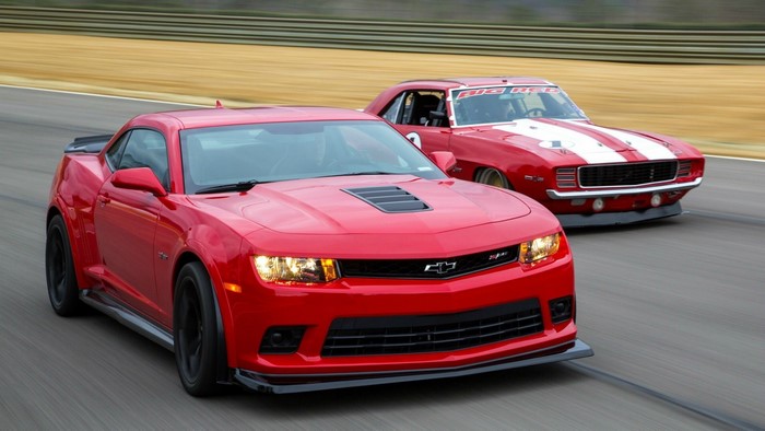 Two Chevrolet Camaros on a Racetrack