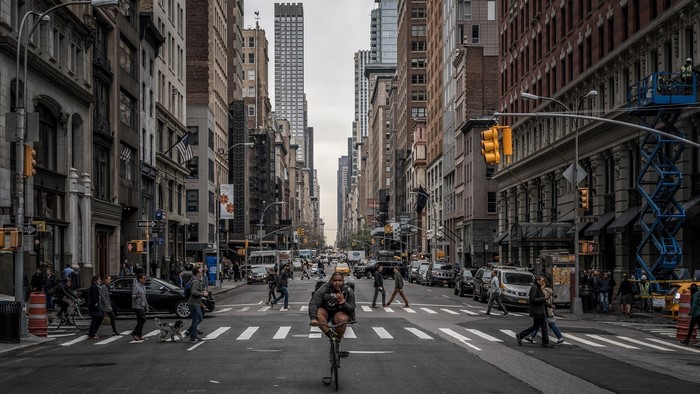 New York City street with pedestrians and traffic