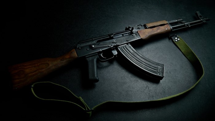 AK-47 assault rifle with wooden furniture and sling