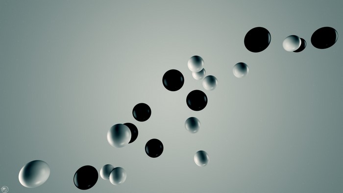 Black and white spheres floating