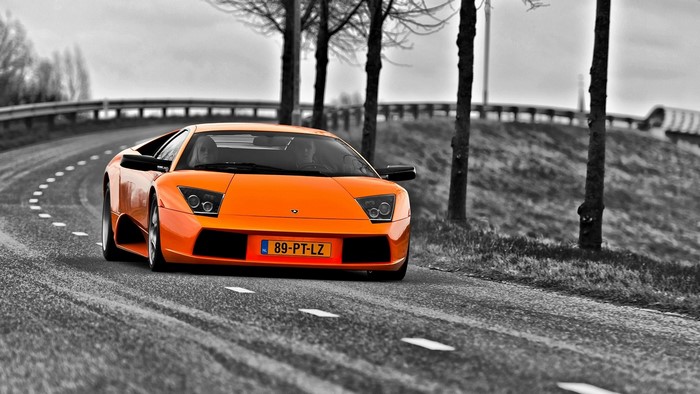 Orange Lamborghini Murcielago on a Winding Road