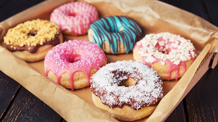 Assortment of colorful donuts in a box