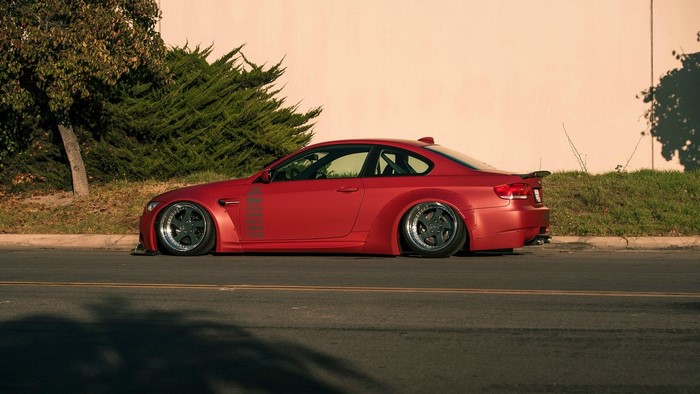 Red 2009 BMW E92 335i modified car