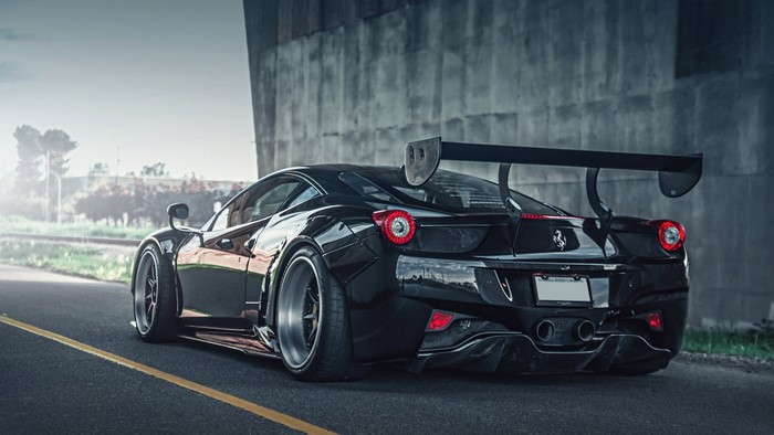 Black Ferrari 458 Italia with large rear wing