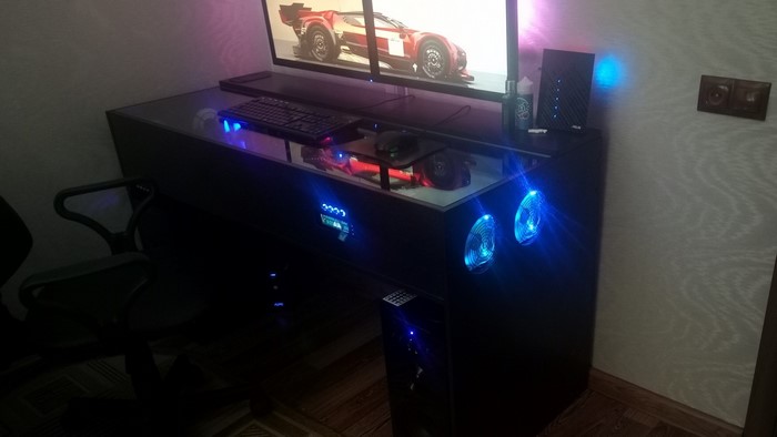 Computer desk with PC and gaming chair