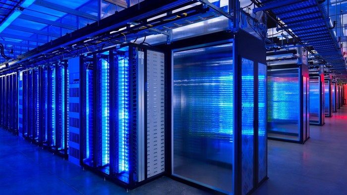 Data center with rows of servers and blue lights