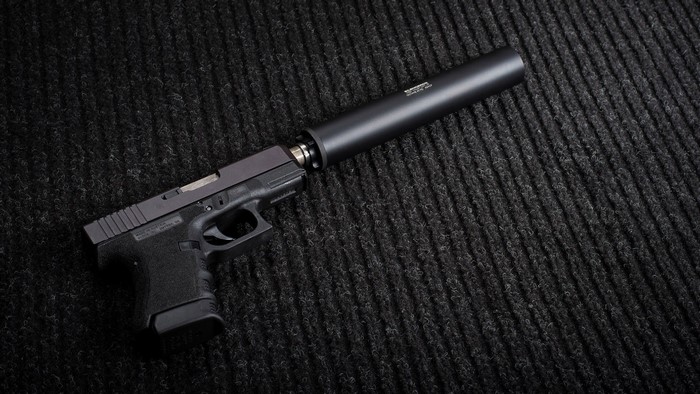 Glock 30 SF pistol with suppressor