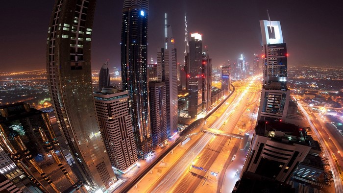 Dubai Cityscape at Night with Highway