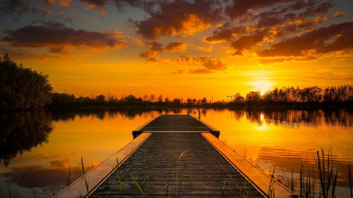 Wooden pier on a lake at sunset in Germany