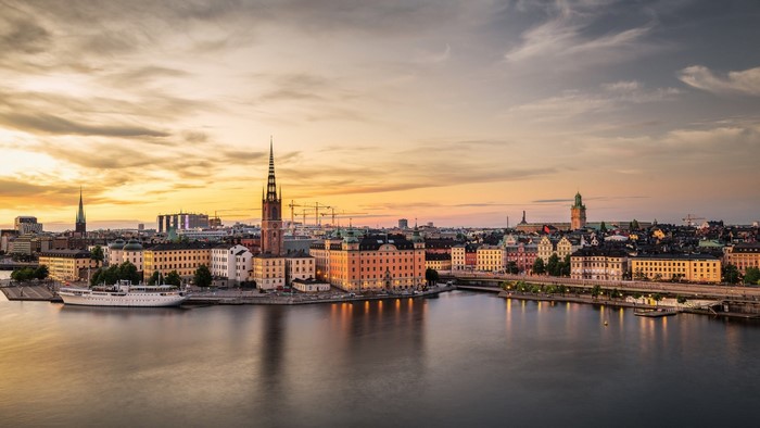 Stockholm cityscape with water and sky at sunset