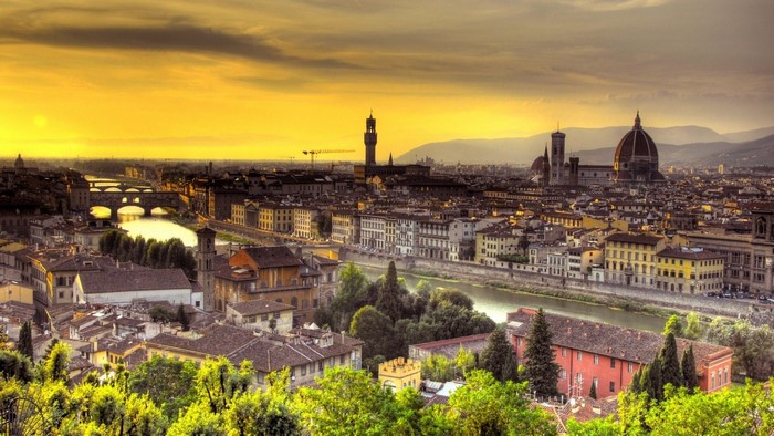 Florence cityscape with Arno River and bridges at sunset