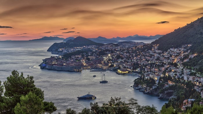 Dubrovnik, Croatia at sunset with boats