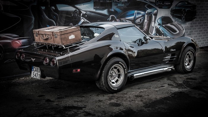 Black 1976 Chevrolet Corvette Stingray with Luggage