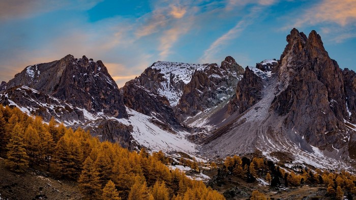French Alps with autumn trees and snow
