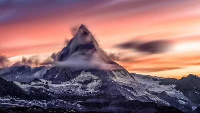 Matterhorn mountain at sunset with clouds