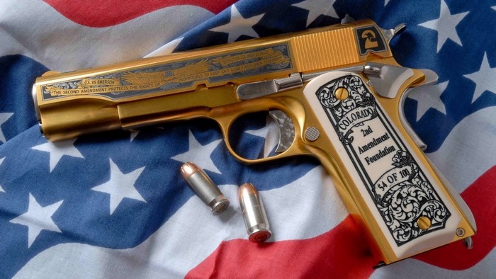 Gold M1911 pistol with "Colorado 2nd Amendment Foundation" engraving