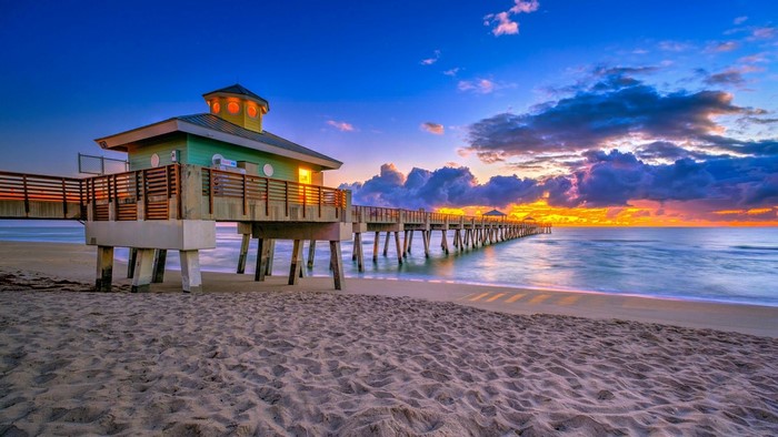 Sunrise over a pier in South Florida