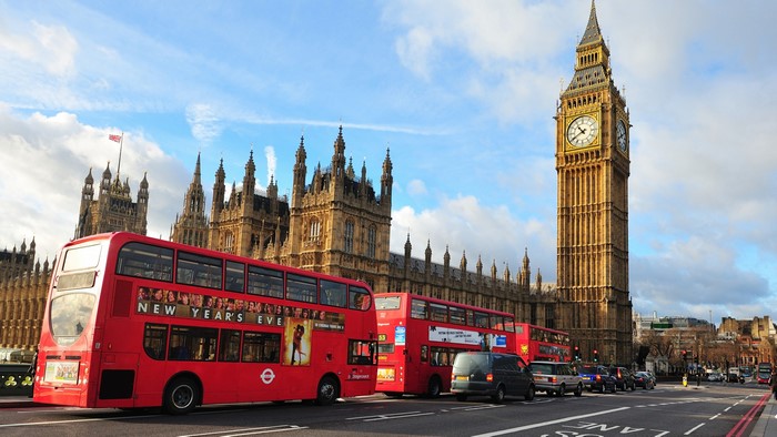 Big Ben and Parliament with Red Buses in London