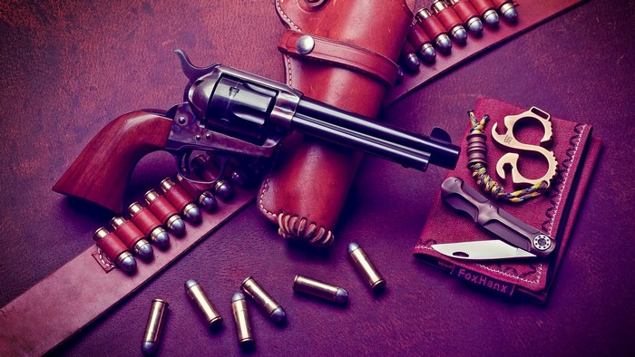 Colt Single Action Army Revolver with Ammunition and Knife