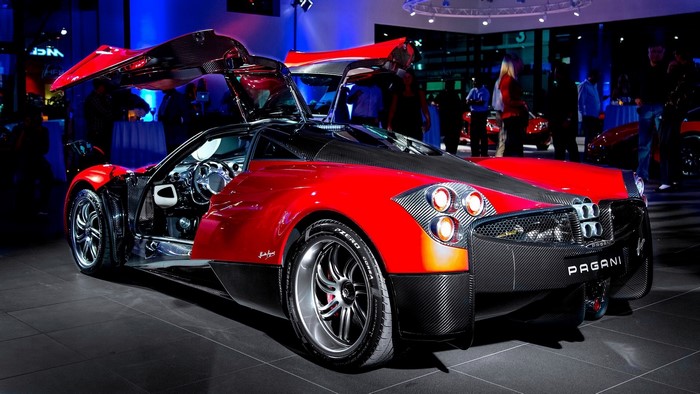 Red Pagani Huayra with doors open