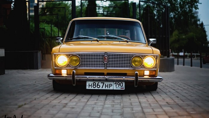 Yellow Lada Zhiguli car with Russian license plate