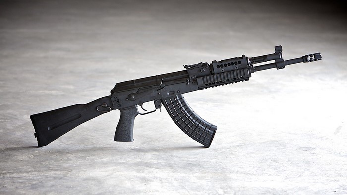 AK-47 rifle on a concrete surface