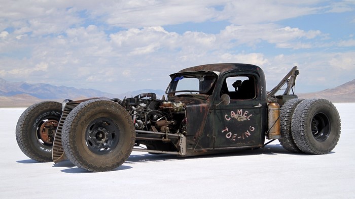 Rat Rod tow truck with "Camel Toe-ing" text
