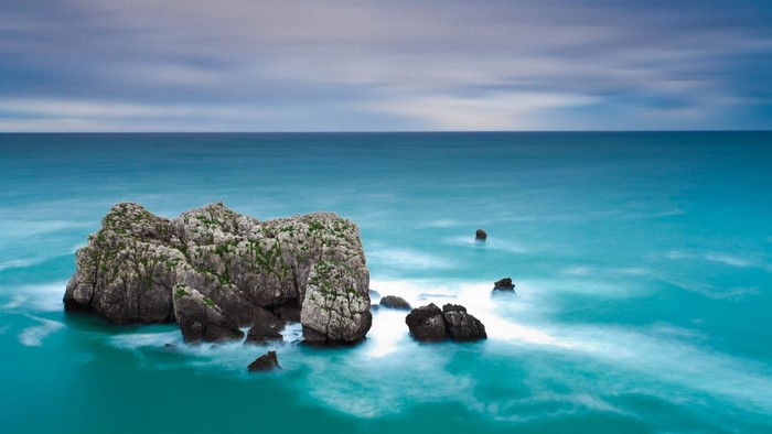 Rocky Outcrops in Blue Ocean Horizon