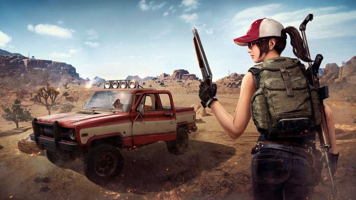 PlayerUnknown's Battlegrounds desert scene with woman and truck