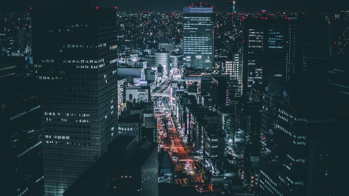 4K Night Cityscape with Skyscrapers and Traffic