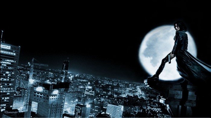 Selene from Underworld on a rooftop at night