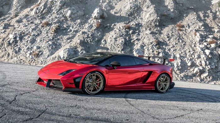 Red Lamborghini Gallardo on a Mountain Road