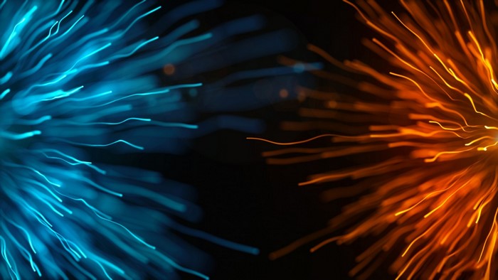Abstract particles blue and orange light trails