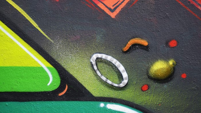Graffiti art on a textured wall