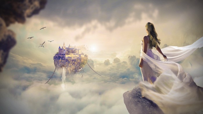 Girl in white dress overlooking a floating castle