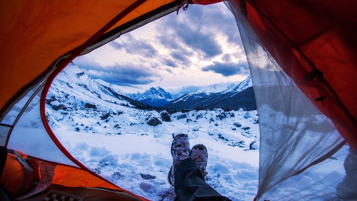 Tent view of snowy mountains in Alberta, Canada
