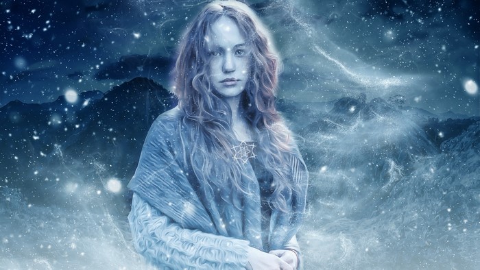 Girl in a snowy landscape with stars