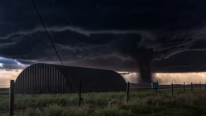 Tornado approaching a Quonset hut in Colorado