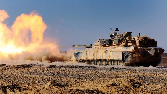 M1A1 Abrams tank firing in desert