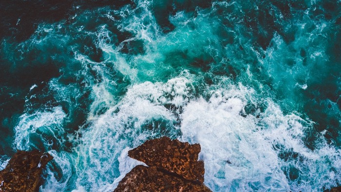 Ocean Waves Crashing on Rocky Shore