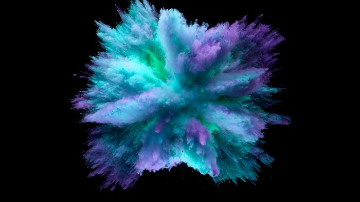 Abstract explosion of blue and purple powder