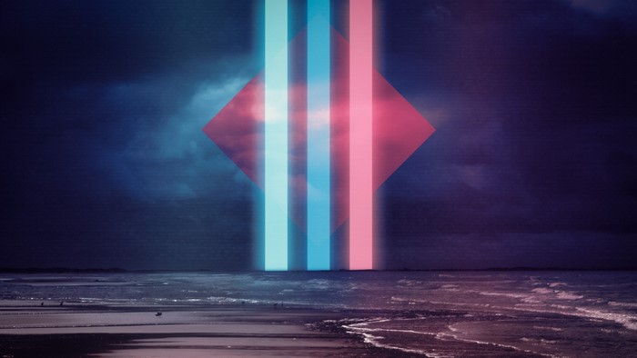 Neon lights over a beach at dusk