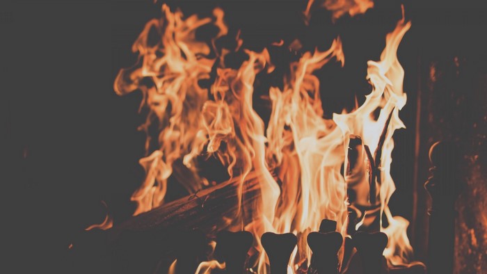 Fireplace with burning logs