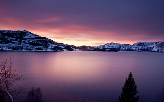 Lake and mountains at sunrise in Norway
