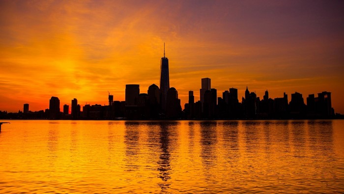 New York City skyline at sunset over water