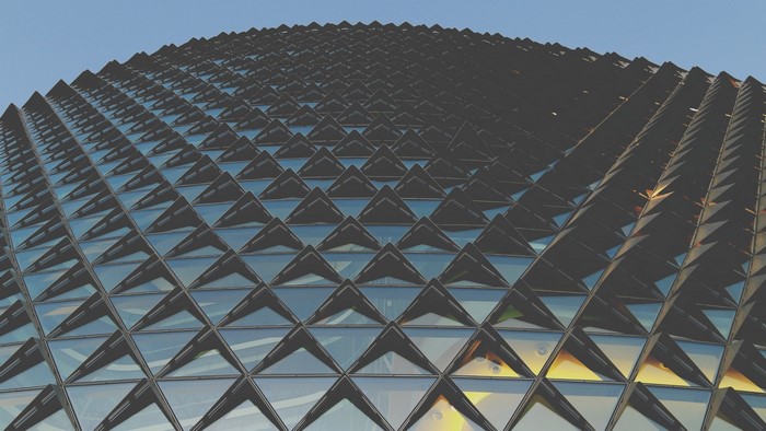 Geometric building facade with triangular windows