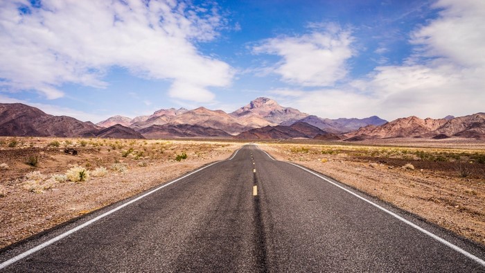 Road leading to mountains in California, USA
