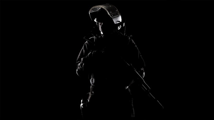 Special Forces soldier with rifle and helmet