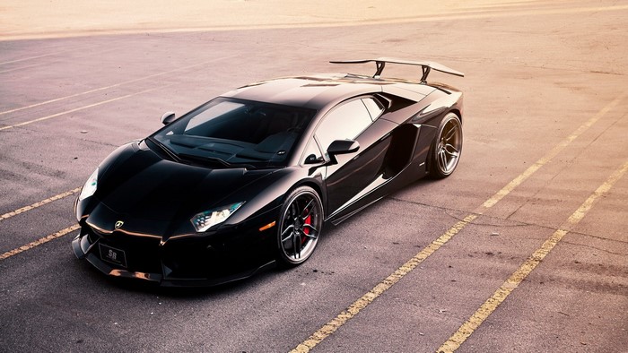 Black Lamborghini Aventador LP 700-4 with spoiler